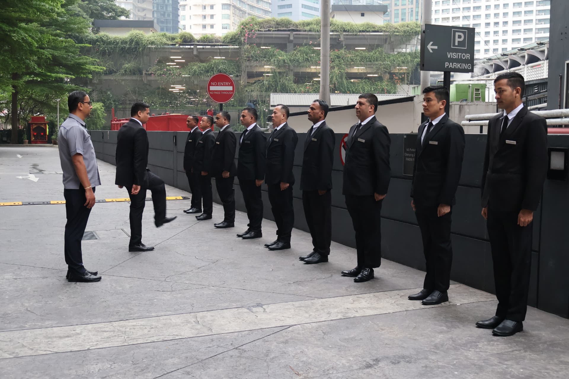 Kaliber instructor addressing a line of security officers